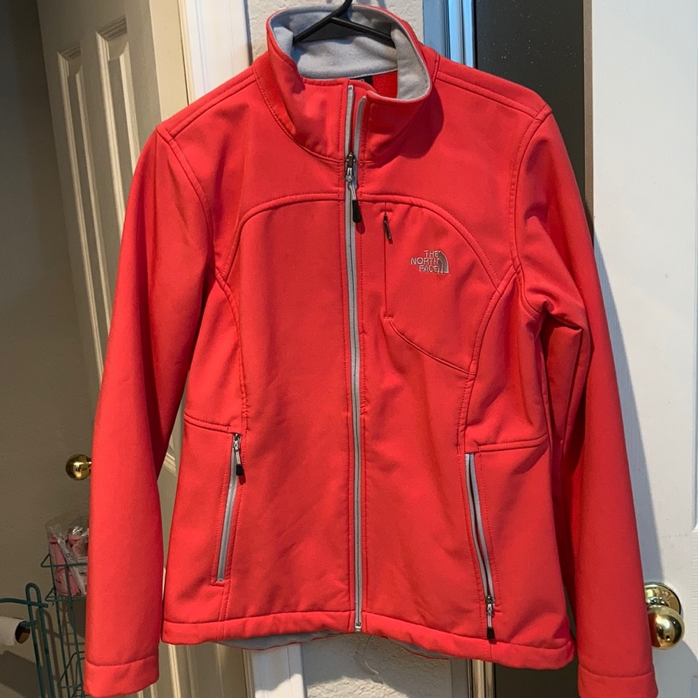 Pink north face jacket.